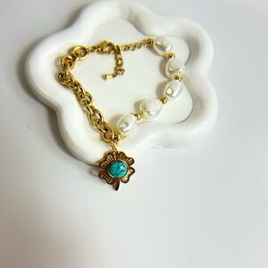 Gold and White Bracelet with Flower Charm